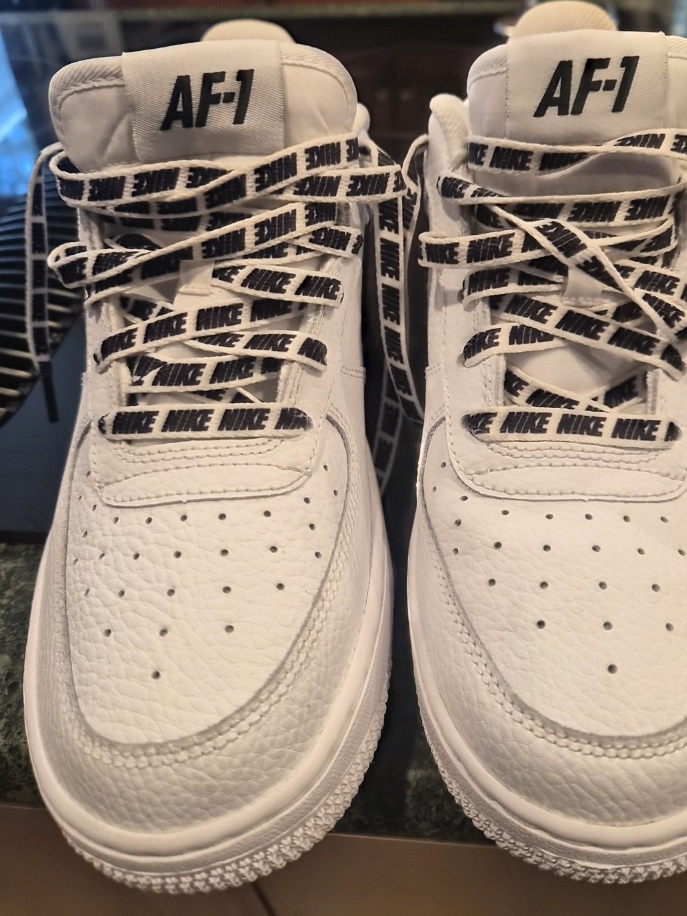 Nike Kids White Leather Sneakers with Branded Black-Text Laces